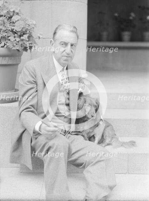 Alanson, Bertram, Mr., with dog, seated on steps, 1927 Creator: Arnold Genthe.