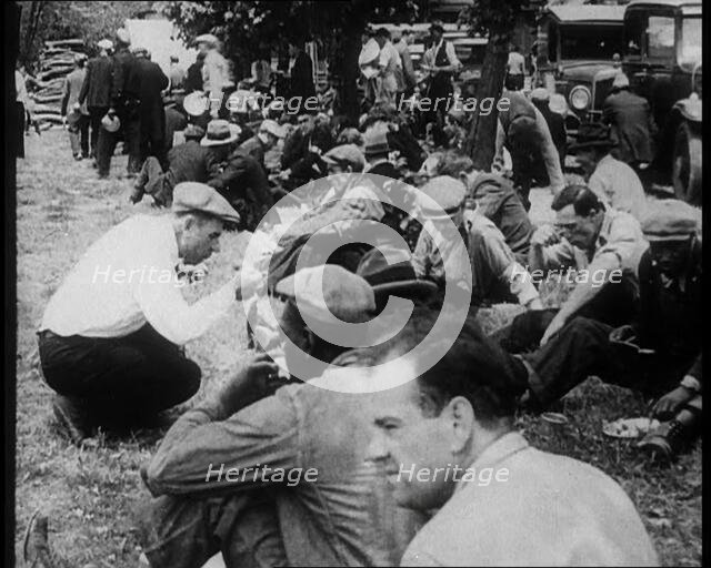 Large Crowd of American Civilians Eating Meals Outdoors, 1930. Creator: British Pathe Ltd.