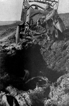 'Les Automobiles militaires au peril et a l'honneur; Camion demoli, pres de Verdun, par..., 1916. Creator: Unknown.