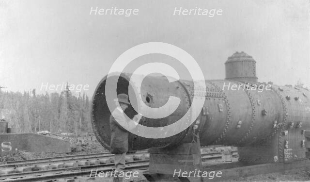 Frank G. Carpenter inspecting new railroad, between c1900 and 1916. Creator: Unknown.
