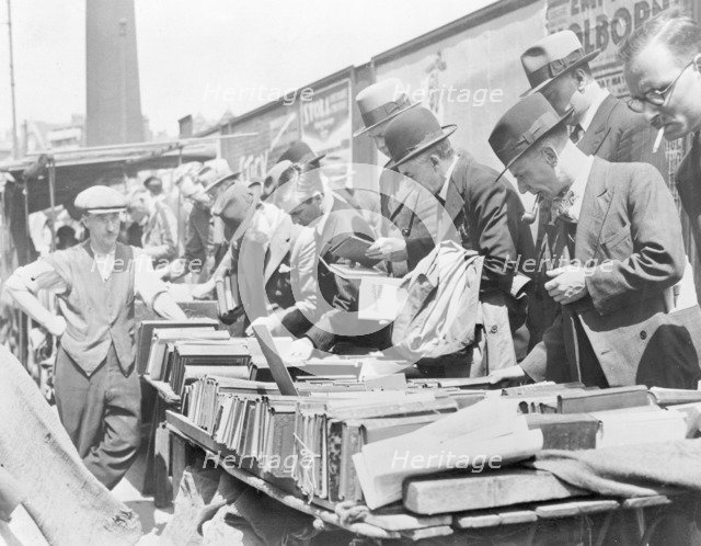 Booksellers in Farringdon Road, London. Artist: John H Stone