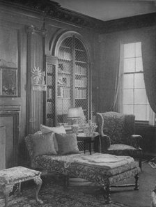 Comfortable corner in the library showing bookcase, house of Miss Anne Morgan, New York City, 1924. Artist: Unknown.