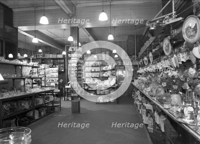 Co-op store showing a sales receipt transfer system, Barnsley, South Yorkshire, 1955. Artist: Michael Walters