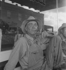 Dust bowl farmers of west Texas in town, 1937. Creator: Dorothea Lange.