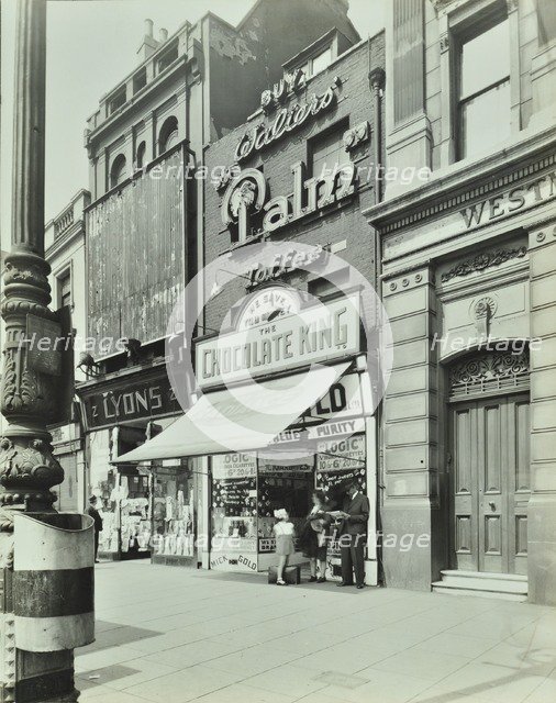 'Chocolate King' sweetshop, Upper Street, Islington, London, 1944. Artist: Unknown.