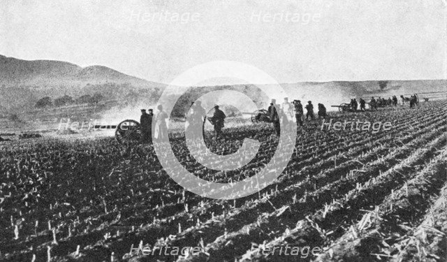 Russian field artillery in the millet field, Russo-Japanese War, 1904-5. Artist: Unknown