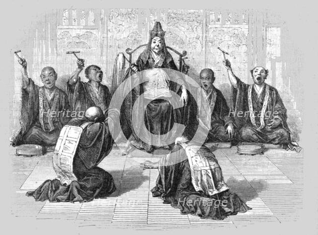 'Buddhist high-priest worshipped by his subordinates; A European Sojourn in Japan', 1875. Creator: Unknown.