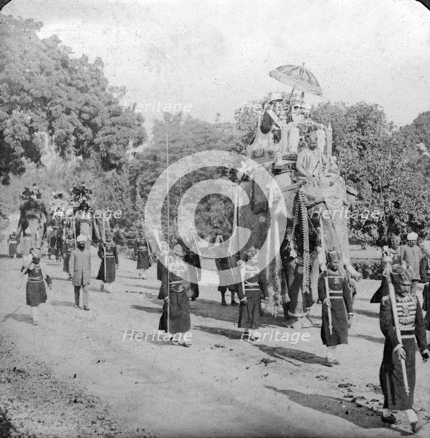 Lord and Lady Harding riding an elephant, India, 1913.Artist: HD Girdwood