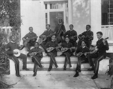 Hampton Institute, Hampton, Va., ca. 1898 - 11 students in uniform playing guitars..., 1899 or 1900. Creator: Frances Benjamin Johnston.