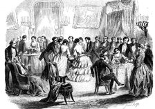 Spiritualist meeting in a Paris drawing room, 1853. Artist: Unknown
