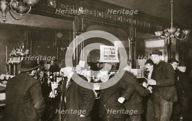 Customers drinking in a bar in the Bowery, New York City, USA, 1900s. Artist: Unknown