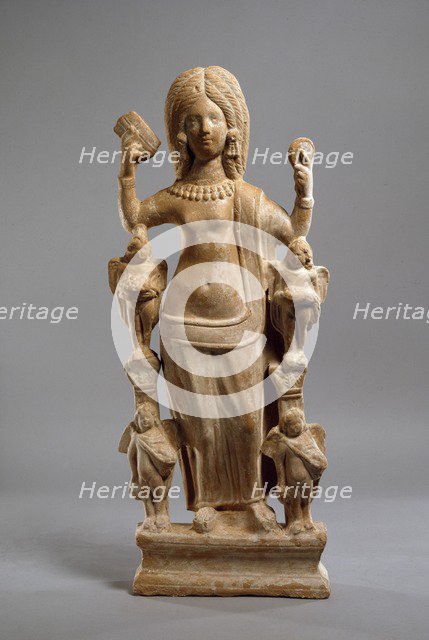 Terracotta statuette of Venus, or a young woman dressed at Venus, at her toilet, c200-230. Artist: Unknown.