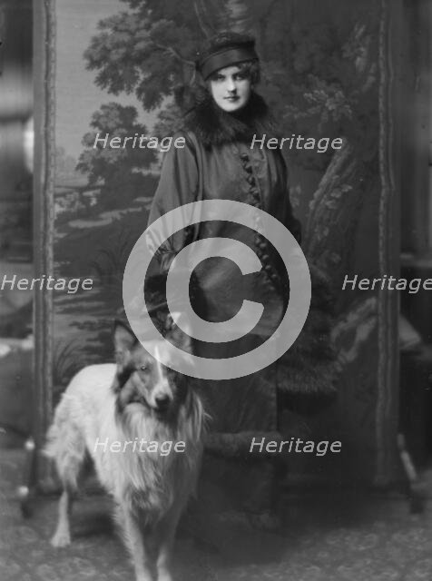 Phillips, Norma, Miss, with dog, portrait photograph, 1914 Nov. 28. Creator: Arnold Genthe.