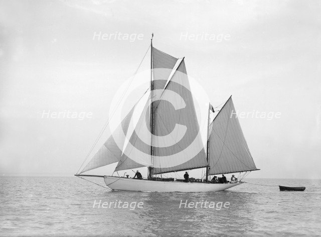 The yawl 'Meander' sailing in close-hauled, 1913. Creator: Kirk & Sons of Cowes.
