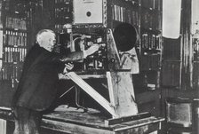 Thomas Alva Edison (Milan, Ohio, 1847-West Orange, New Jersey, 1931) in his lab, inventor of the …