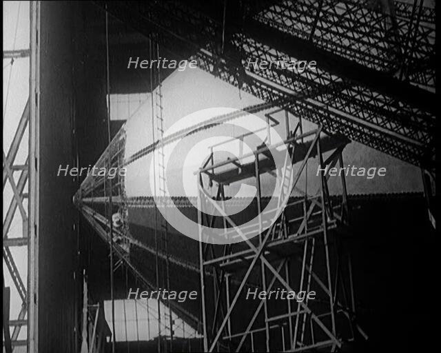 A Partially Constructed R 38 Airship Sitting in a Hangar, 1921. Creator: British Pathe Ltd.