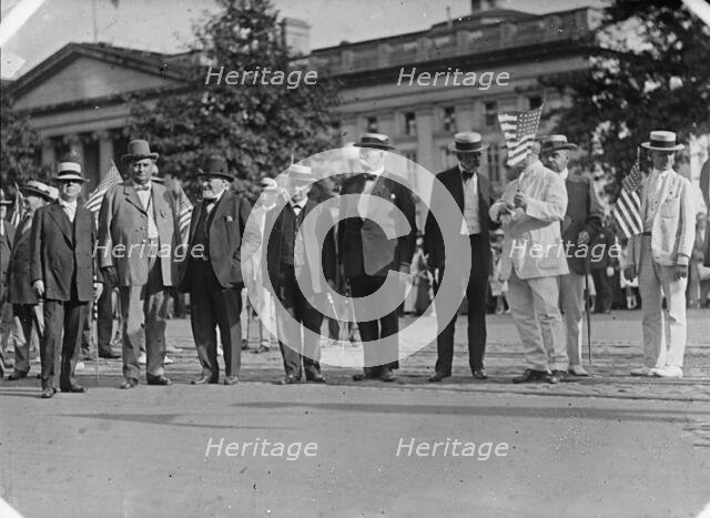 Draft Parade - Senators: Chamberlain; J.H. Bankhead; Knute Nelson; Hardwick; Warren; Lodge..., 1917. Creator: Harris & Ewing.