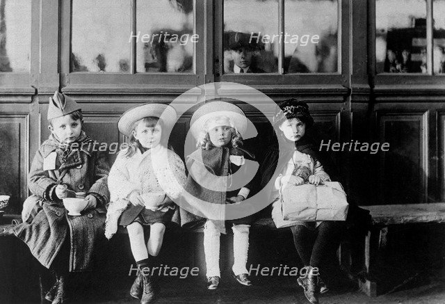 French refugee children waiting for a train, 20 January 1918. Artist: Anon
