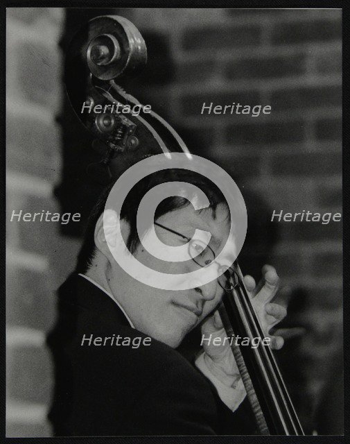 Japanese bassist Kengo Nakamura playing at The Fairway, Welwyn Garden City, Hertfordshire, 2004. Artist: Denis Williams