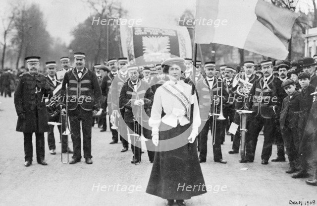 Daisy Dugdale leading the procession to welcome Emmeline and Christabel Pankhurst, London, 1908. Artist: Unknown