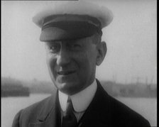 Italian Senator Guglielmo Marconi Standing on the Stern of a Ship, 1920. Creator: British Pathe Ltd.