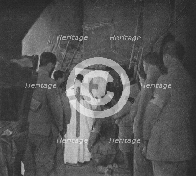 'Apres la reprise du Fort de Vaux; la premiere messe, dans une casemate du fort reconquis', 1916. Creator: Unknown.