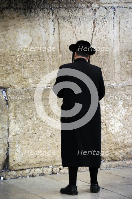 A Jew praying at the Western Wall, Jerusalem, Israel, 2013.  Creator: LTL.