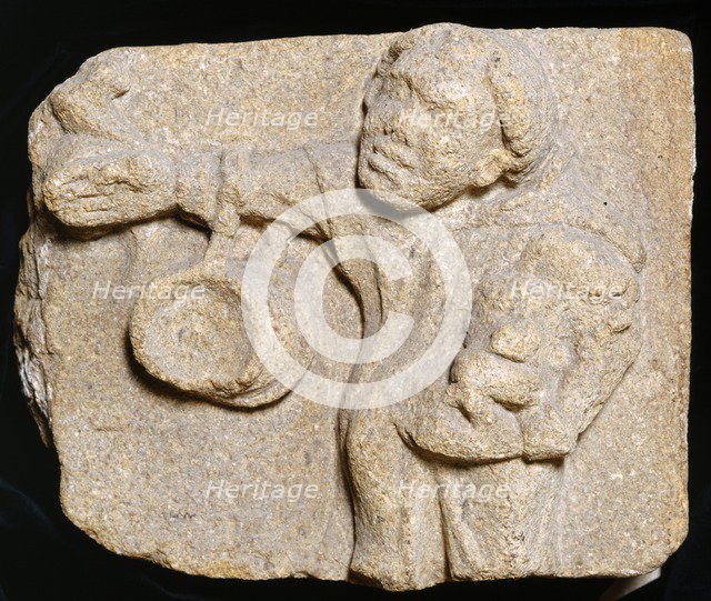 Carved stone depicting a monk carrying items, Muchelney Abbey, Somerset, c2010. Artist: Jonathan Bailey.