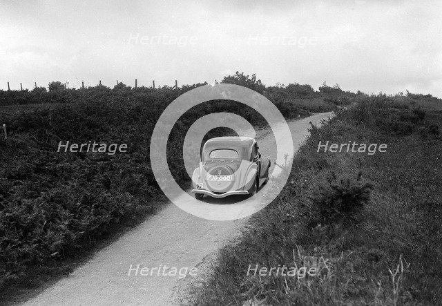 Ford V8 of Viscount Chetwynd competing in the MCC Torquay Rally, 1938. Artist: Bill Brunell.