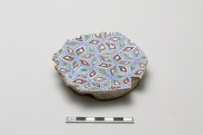 Fragmentary base of a bowl with with abstracted all-over design, early 13th century. Creator: Unknown.