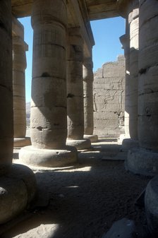 View through to relief of Rameses II before Amun & Mut, Temple of Rameses II, Luxor, Egypt. Artist: Unknown