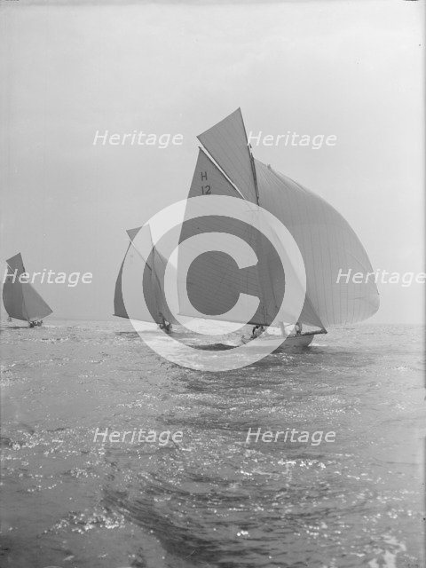 'The Truant' and 'Antwerpia IV' racing with spinnakers, 27th May 1912. Creator: Kirk & Sons of Cowes.