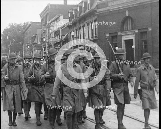 US Army Troops With Guns Marching, 1932. Creator: British Pathe Ltd.