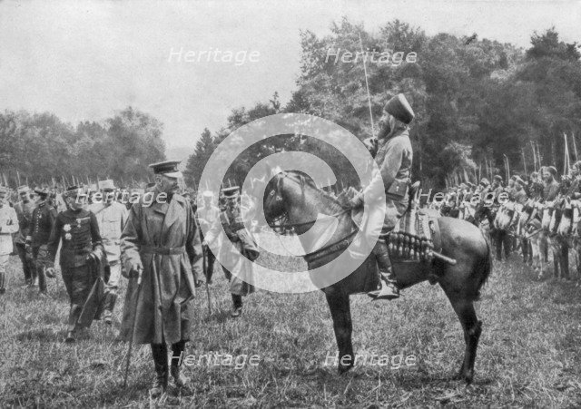 Lord Kitchener inspecting Algerian troops, France, World War I, 16 August 1915. Artist: Unknown