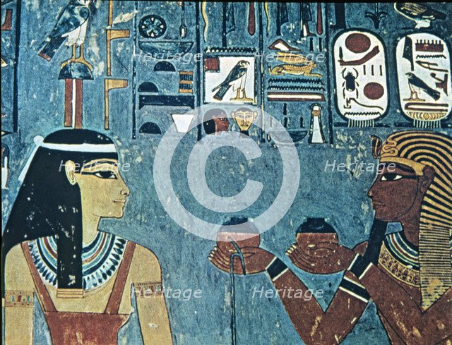 Fresco in the tomb of Horemheb, representing the pharaoh giving offerings to goddess Hathor.