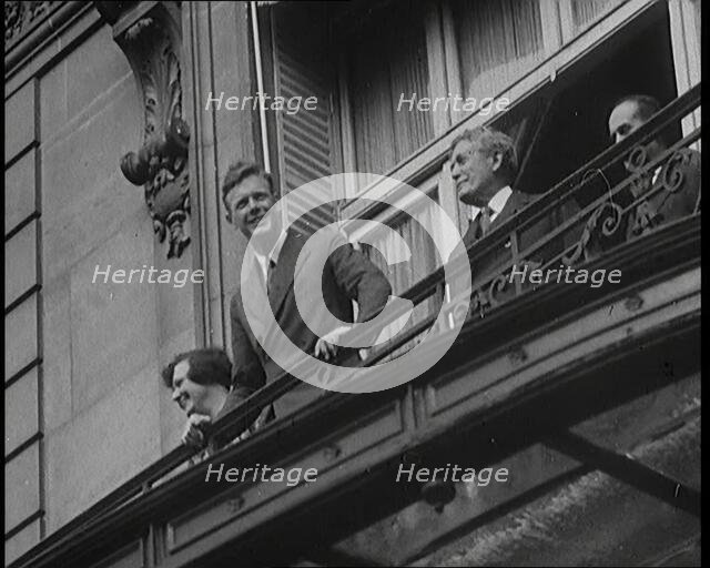 Charles Lindbergh and Anne Morrow Lindbergh On a Balcony Waving To the Press and Crowds, 1927. Creator: British Pathe Ltd.