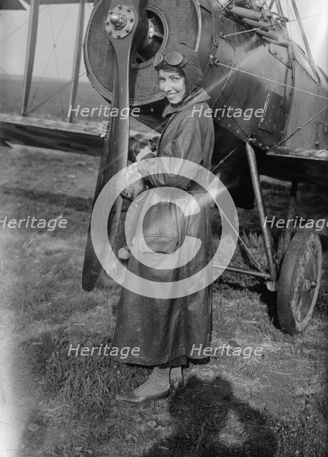 Katherine Stinson with her biplane, between c1915 and c1920. Creator: Bain News Service.