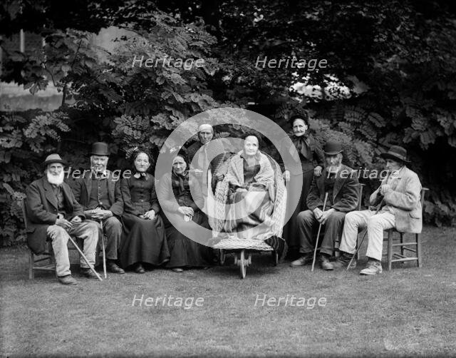 Group portrait of the nine oldest inhabitants of the village, West Ilsley, West Berkshire, 1860-1922 Creator: Henry Taunt.