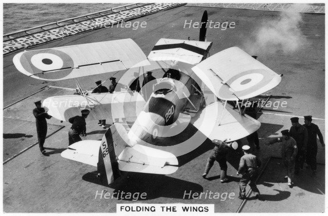 Hawker Osprey on the deck of the aircraft carrier HMS 'Eagle', 1937. Artist: Unknown