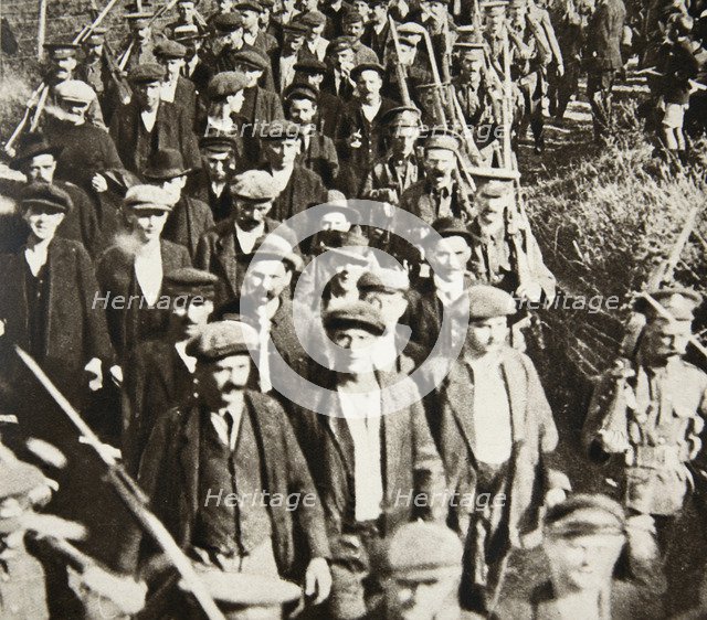 German prisoners of war arriving in Britain, August 1914.  Artist: S and G