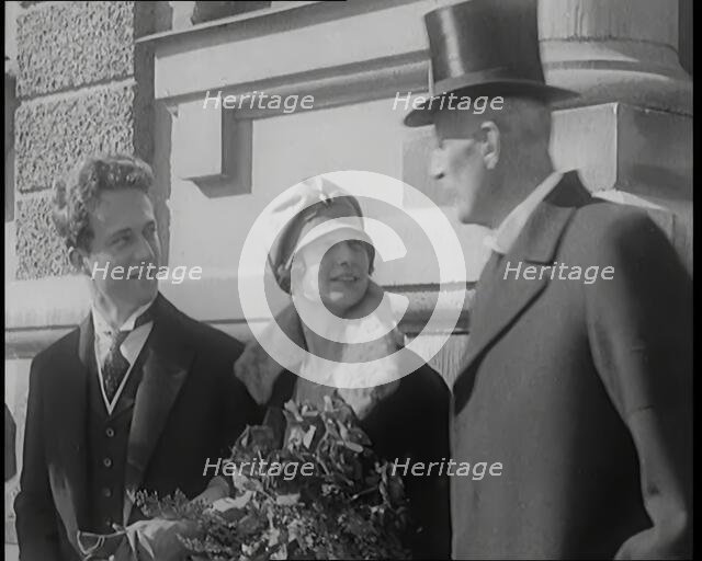 Crown Prince Leopold of Belgium and Princess Astrid of Sweden Walking With Her Parents..., 1926. Creator: British Pathe Ltd.
