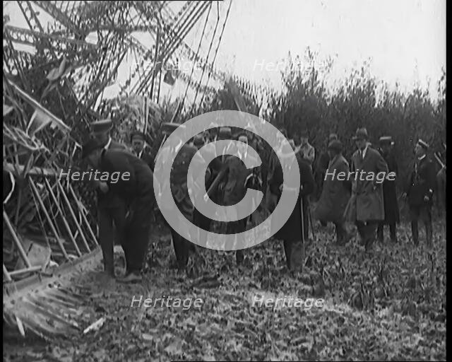 Chief Marshal Sir John Salmond and Other British Officials Walking Around the Wreckage..., 1930. Creator: British Pathe Ltd.