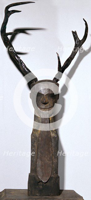 Chinese wooden sculpture of an antlered head. Artist: Unknown