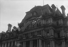 Flags - American, British, And French Flags On State Department. Visit of Allied Commission, 1917. Creator: Harris & Ewing.