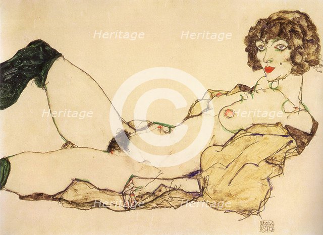 Lying nude with green stockings, 1917.