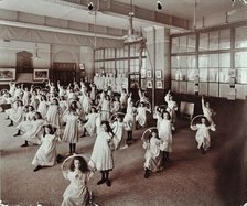 Girls with hoops, Lavender Hill Girls School, Bermondsey, London, 1906. Artist: Unknown.