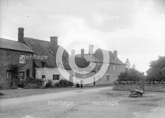 Group outside the Post Office, Coxwell, Oxfordshire, c1860-c1922. Artist: Henry Taunt