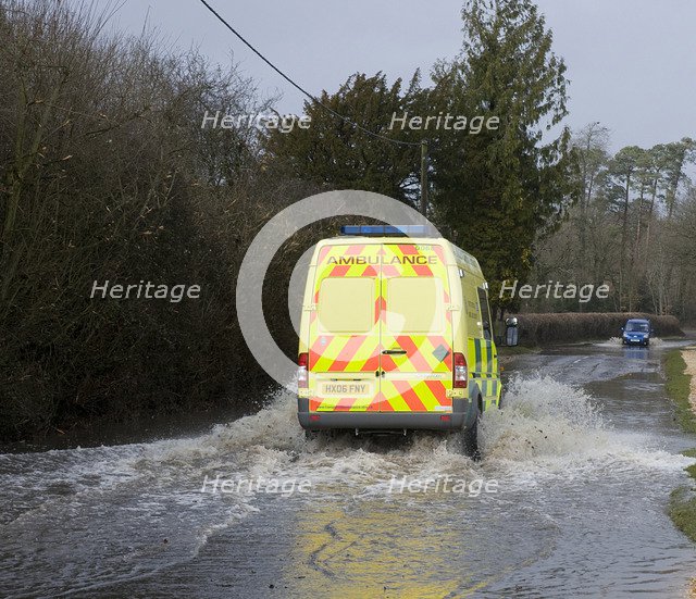 Ambulance driving through Floods at Beauleu 2008. Artist: Unknown.
