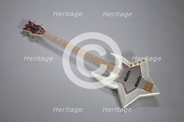 Bootsy Collins Space Bass guitar owned by Bootsy Collins, July 2002. Creator: Washburn Guitars.