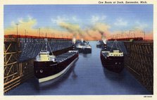 Ore boats at dock, Escanaba, Michigan, USA, 1940. Artist: Unknown